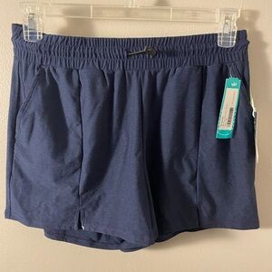 We Wander Flex Step Hem Short Navy Medium New